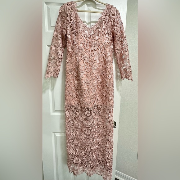 Used once. short dress underneath up to Knee level. Long dress over it. - Picture 1 of 4